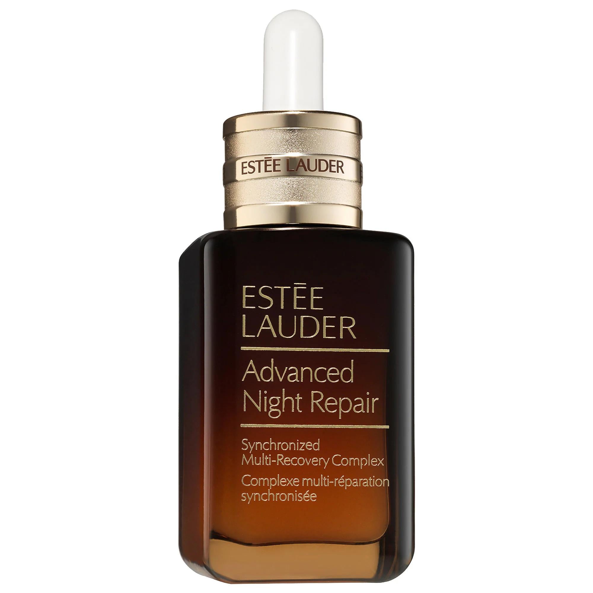 Estee Lauder Advanced Night Repair Serum in a dark amber glass bottle with gold collar and white dropper cap.