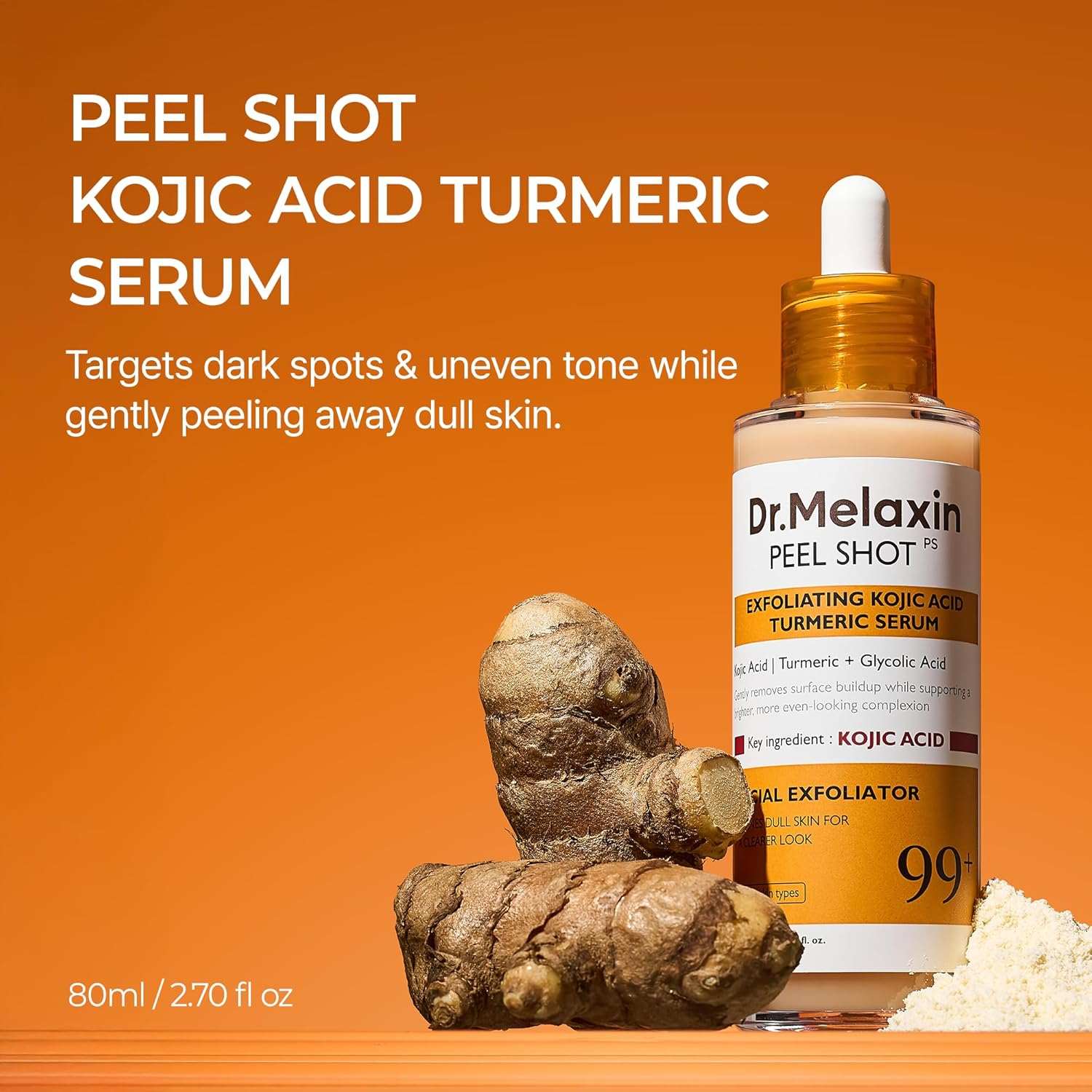 Exfoliating Kojic Acid Turmeric Serum in an amber dropper bottle with a white label and turmeric roots shown beside it