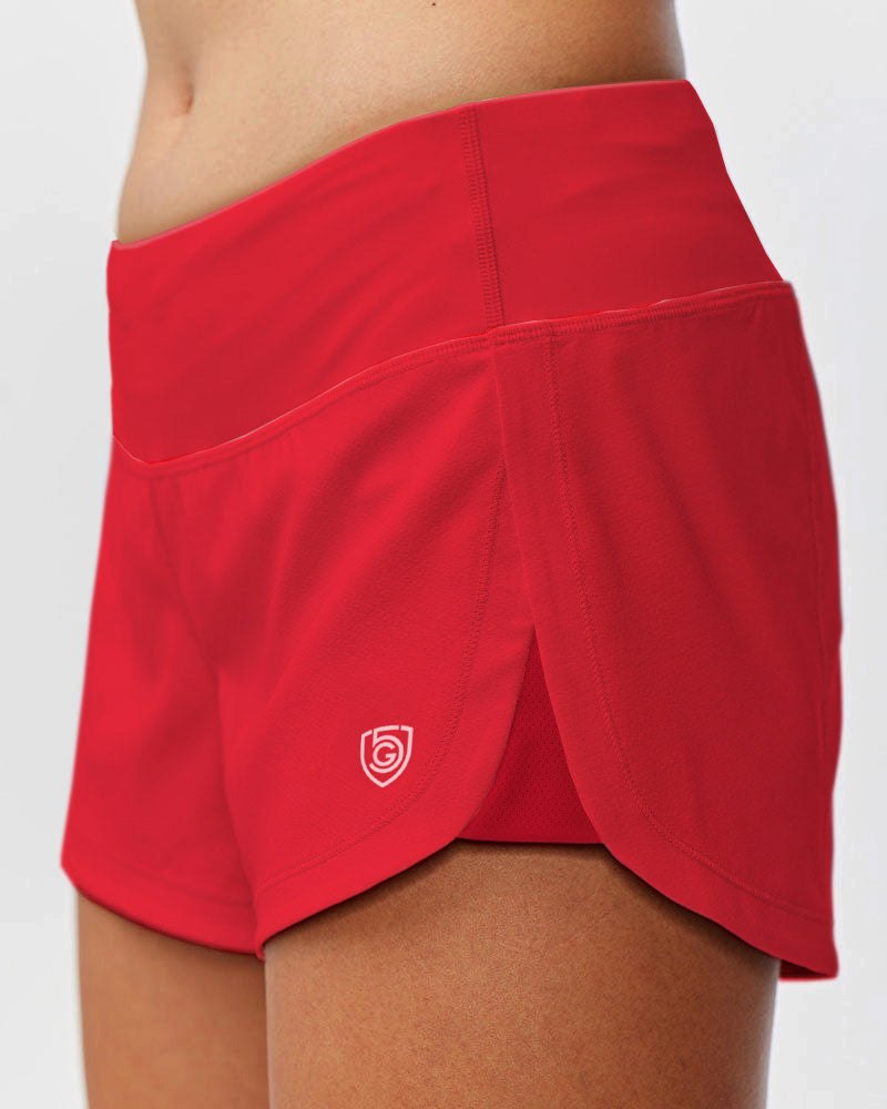 Fast & Free Women's Workout Shorts in bright red stretch fabric with a wide waistband and layered split hems