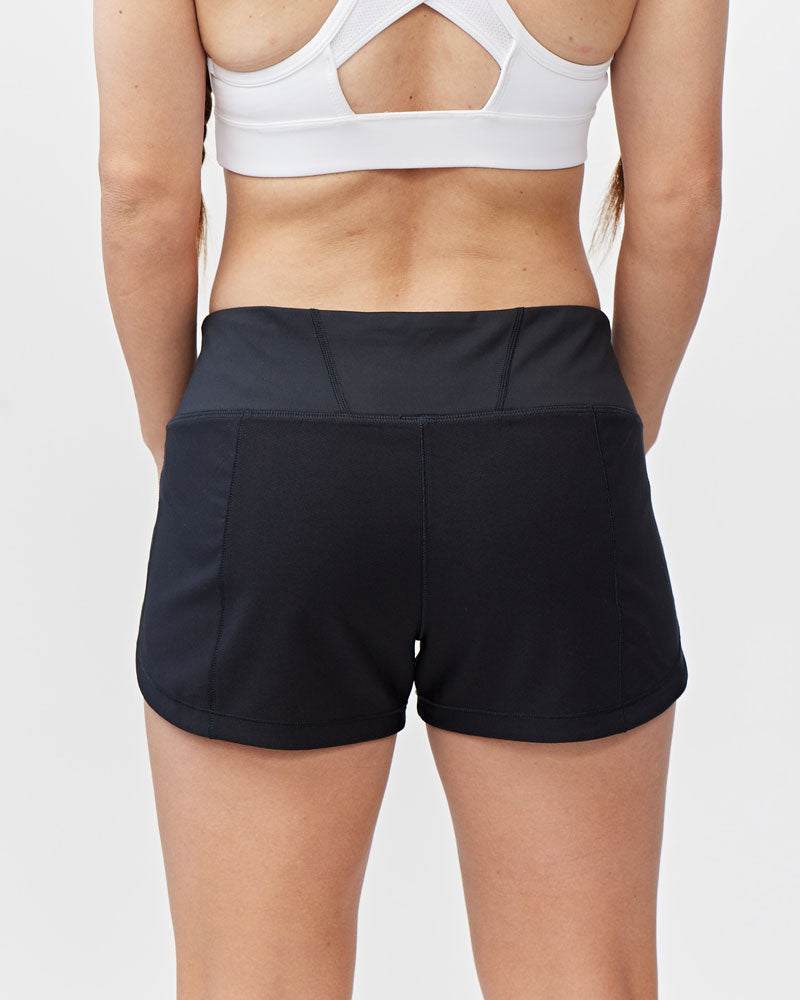 Fast & Free Women's Workout Shorts in black with a wide high-rise waistband and curved hems