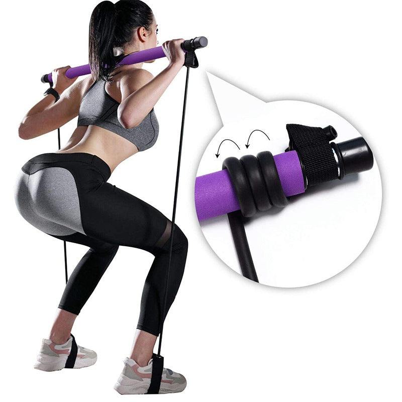 Fitness Yoga Pilates black elastic resistance bands with purple foam-padded bar and adjustable grip rings for home workouts