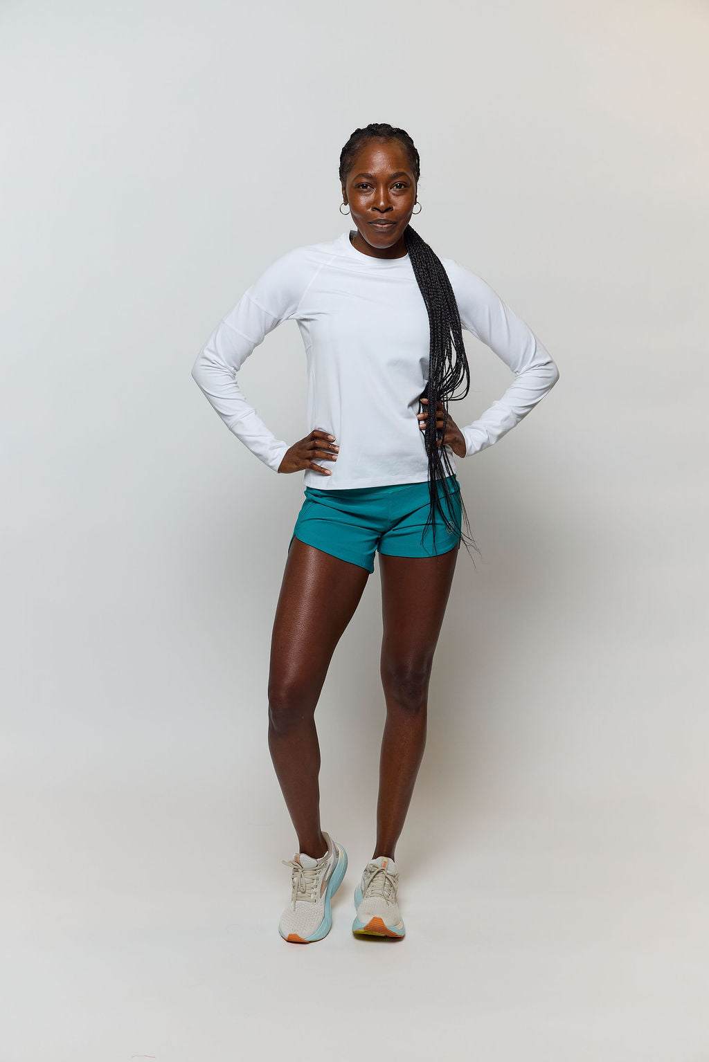 Foudy 2.0 Women's long sleeve athletic top in white, with a crew neck, fitted sleeves and a small upper-arm detail