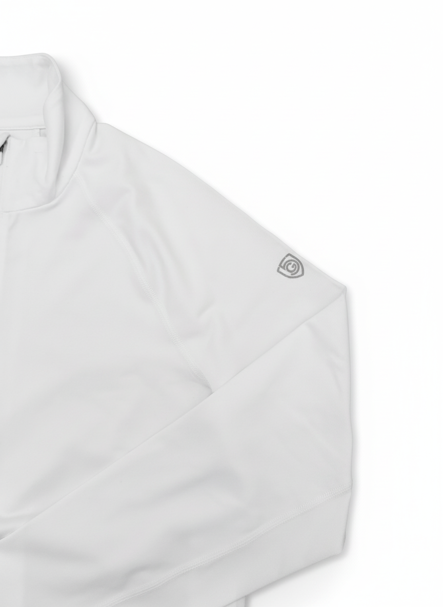 Foudy Mid-Weight Long Sleeve white quarter-zip top with long sleeves and a subtle captain’s armband emblem