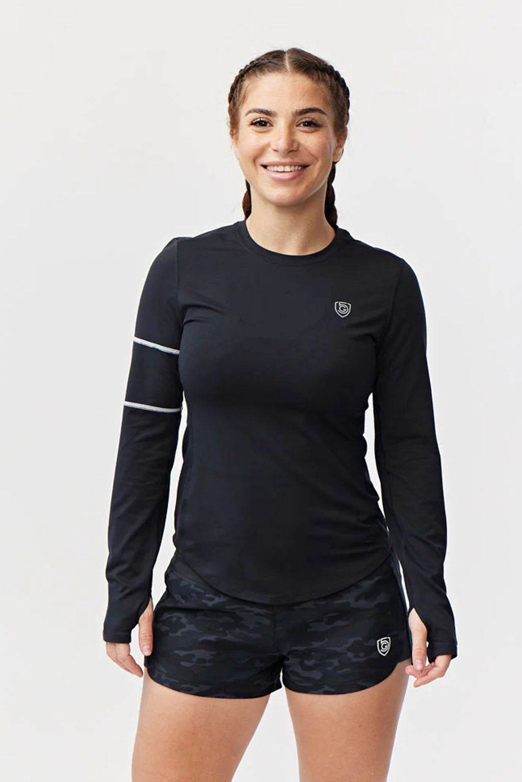 Foudy Women's Longsleeve black fitted workout top with long sleeves, white upper-arm stripe, and small chest emblem