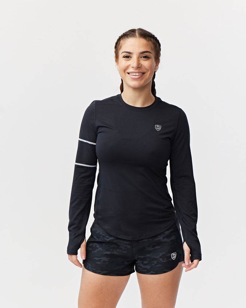 Foudy Women's Longsleeve black fitted workout top with long sleeves, white upper-arm stripes, and a small chest emblem