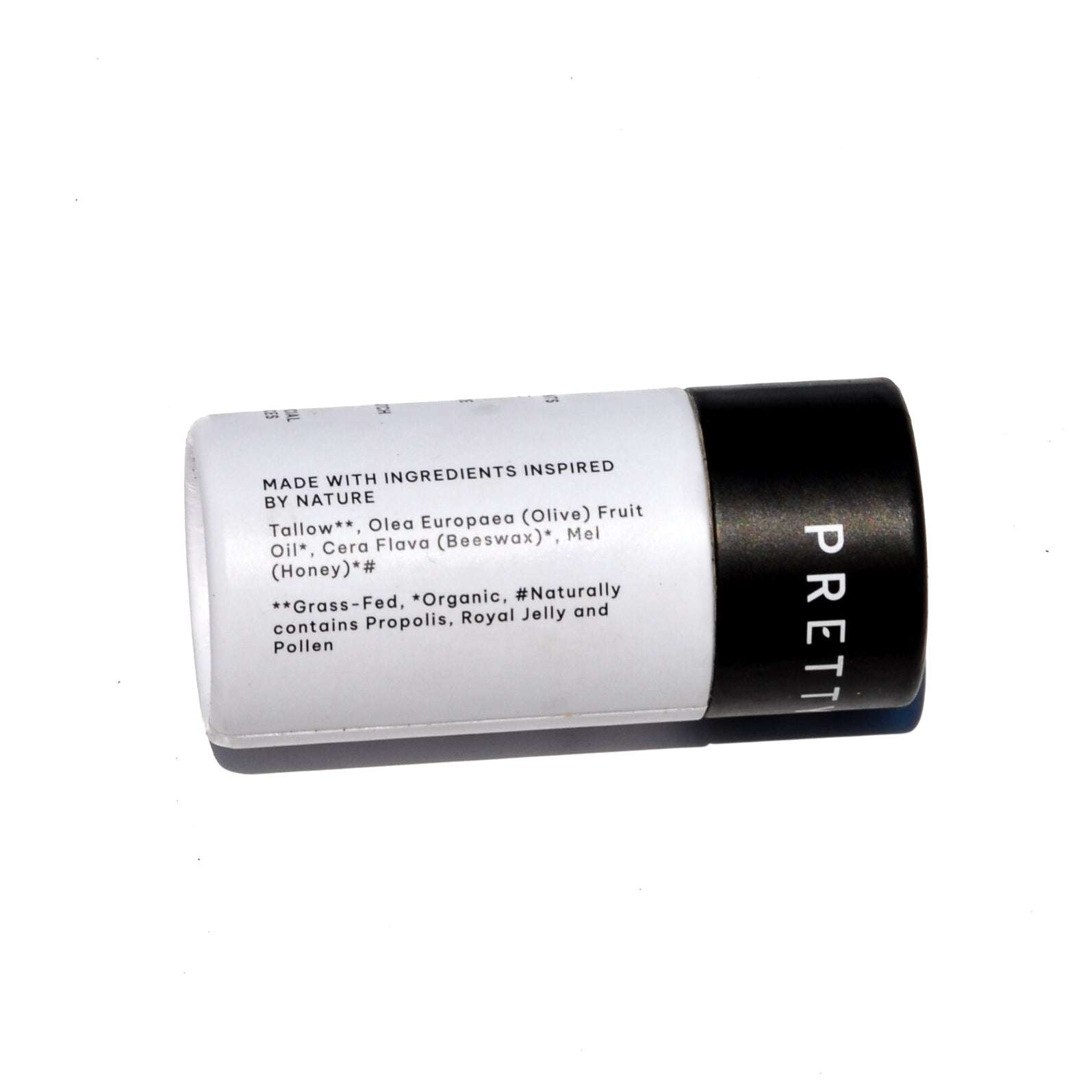 Fragrance Free Tallow + Honey lip butter in a white paper travel tube with black PRETTY cap