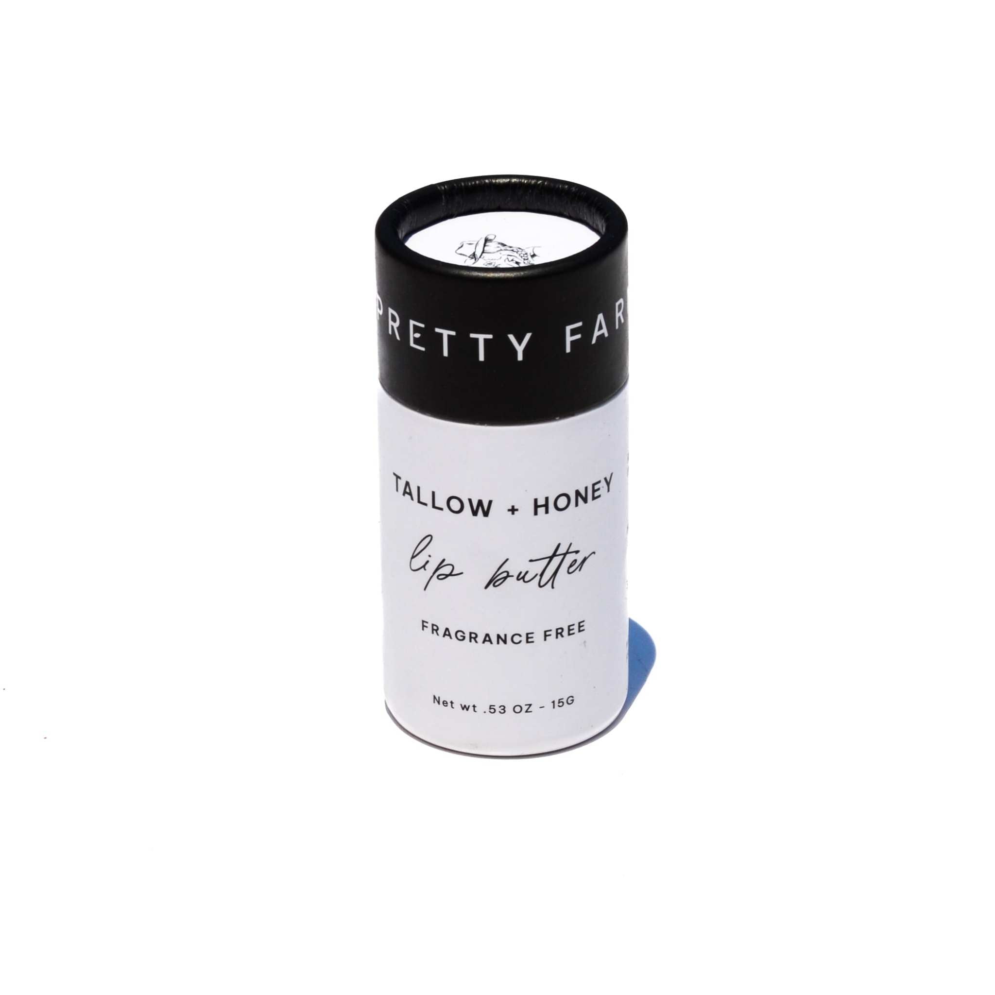 Fragrance Free Tallow + Honey lip butter in a white paper travel tube with black cap