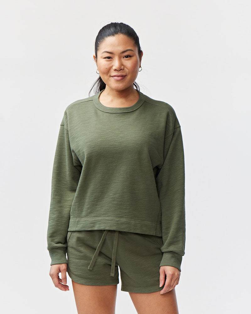 Freasy Crew sweatshirt in olive green with a plain finish, crew neckline, long sleeves, and relaxed fit