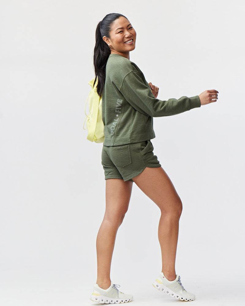 Freasy Crew olive green sweatshirt in a soft solid fabric, paired with matching shorts and a relaxed fit