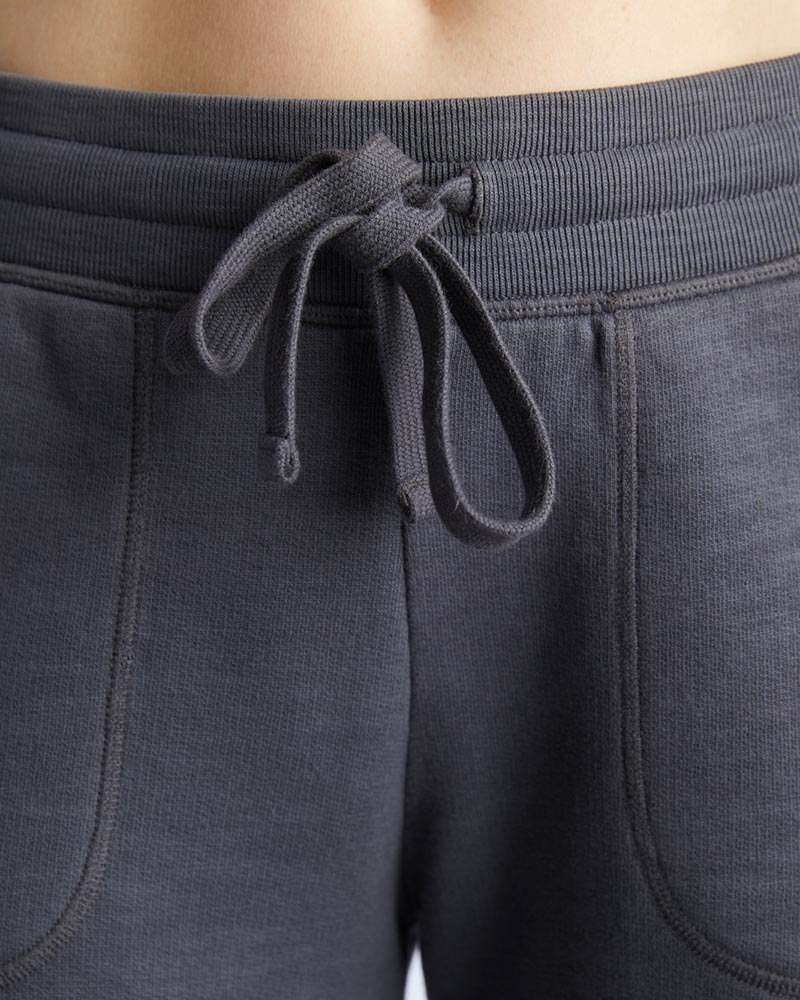 Freasy Jogger in charcoal gray with a ribbed elastic waistband, braided drawcord, and curved front pockets