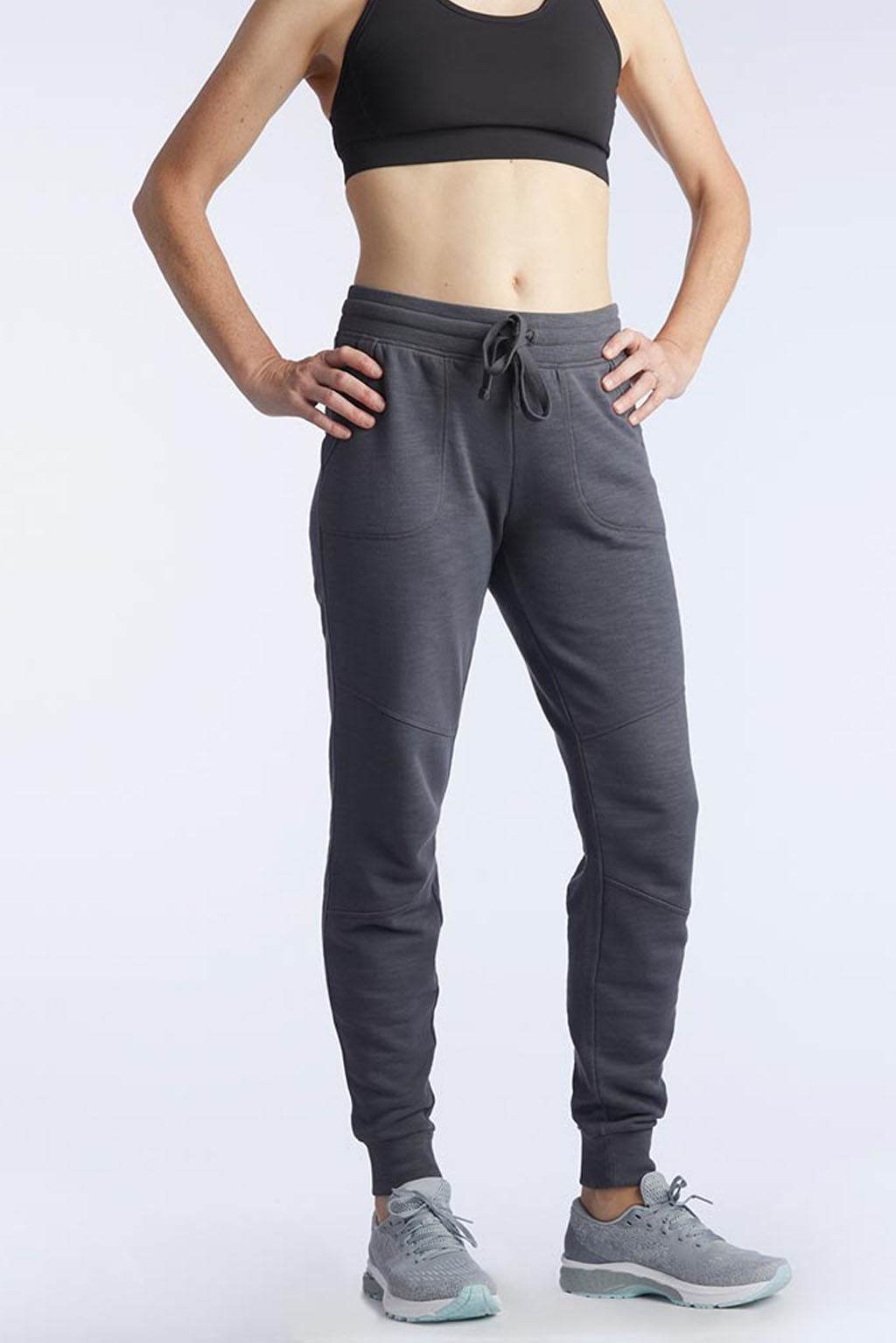 Freasy Jogger in dark charcoal gray with a soft-looking fabric, elastic drawstring waistband, side pockets and tapered ribbed cuffs
