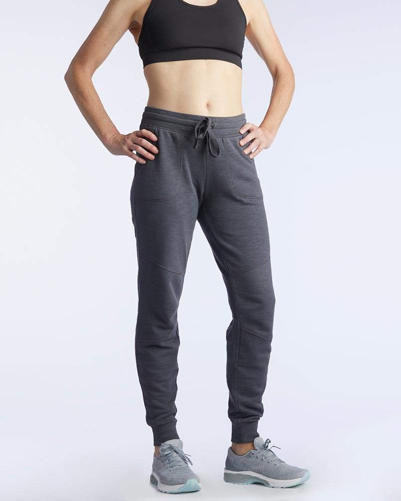 Freasy Jogger in charcoal gray soft fabric with a drawstring elastic waist, side pockets and tapered ribbed ankle cuffs