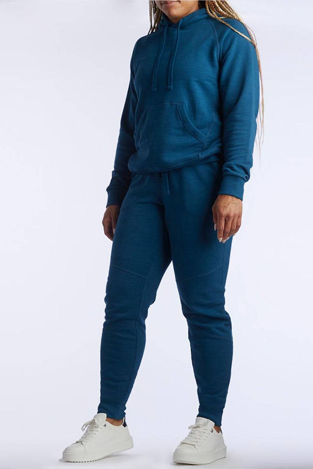 Freasy Jogger in deep teal lightweight fabric, featuring a drawstring elastic waist, tapered legs and ribbed cuffs