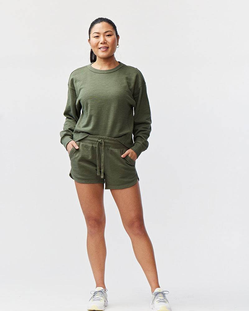 Freasy Short in olive green cotton with a soft finish, elastic drawstring waist, and two front pockets