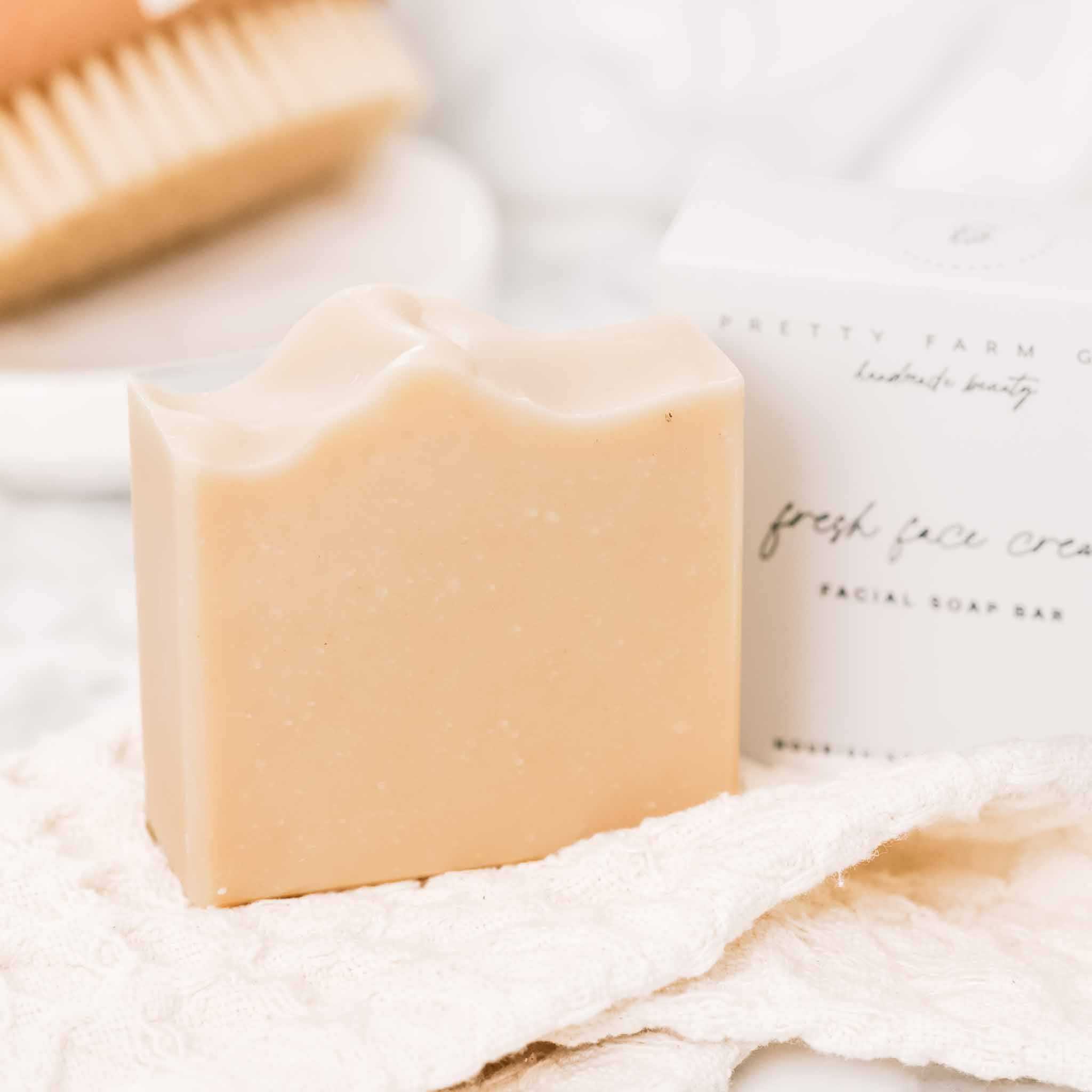 Fresh Face Cream Facial Bar, pale peach handmade soap with a smooth finish and scalloped top edge

