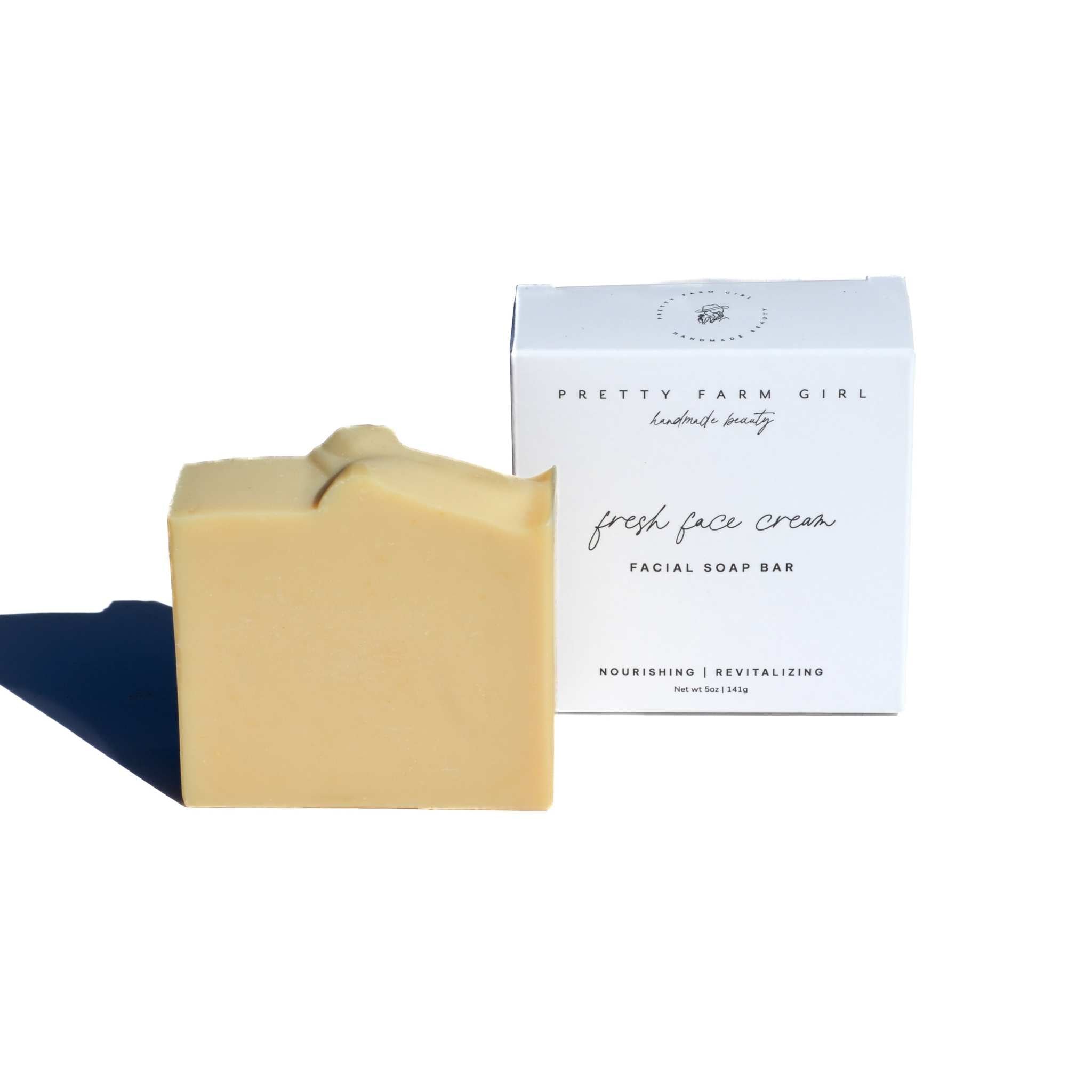 Fresh Face Cream Facial Bar, pale yellow handmade soap with a scalloped top and white branded box
