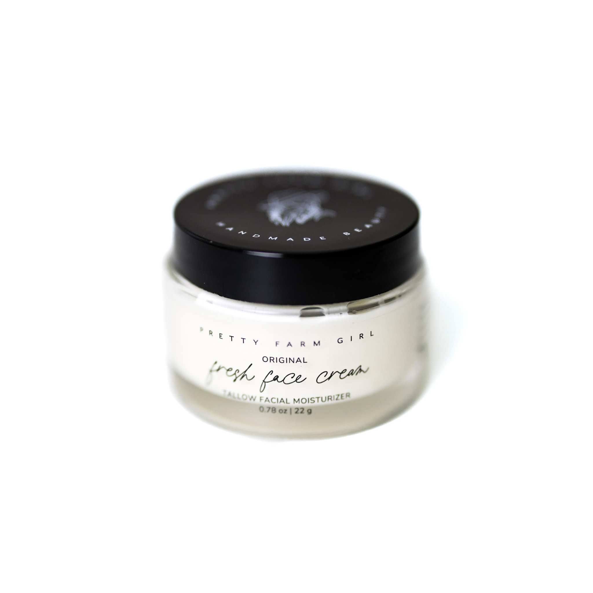 Fresh Face Cream in a clear glass jar with white cream, black plastic lid, and minimalist printed label