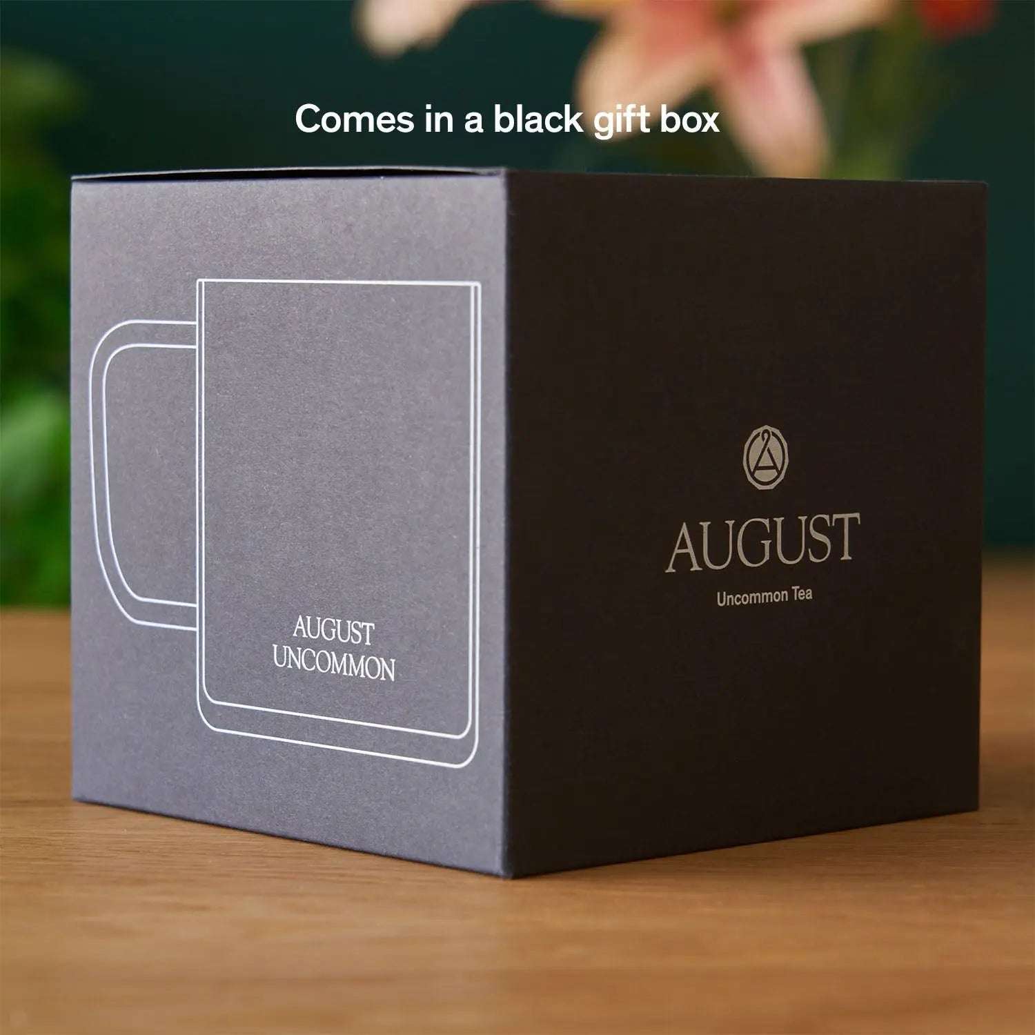 Glass Mug gift box in black and grey, with a white mug outline and August Uncommon Tea branding