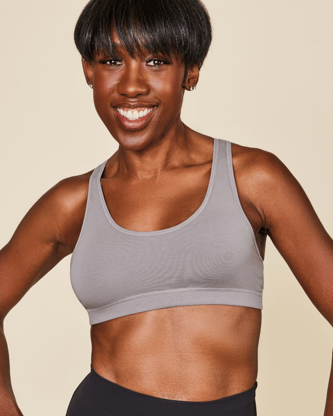 Glide Cotton Racerback Bralette in soft gray cotton with a scoop neckline, wide straps, and a supportive underband