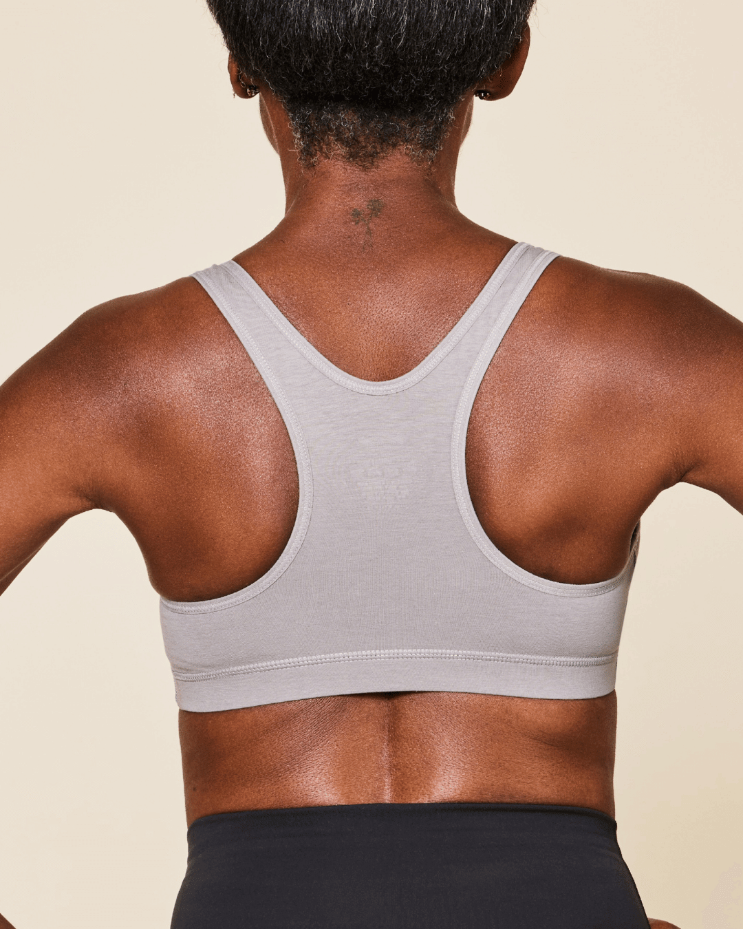 Glide Cotton Racerback Bralette in light grey cotton, featuring a wide racerback and broad underband