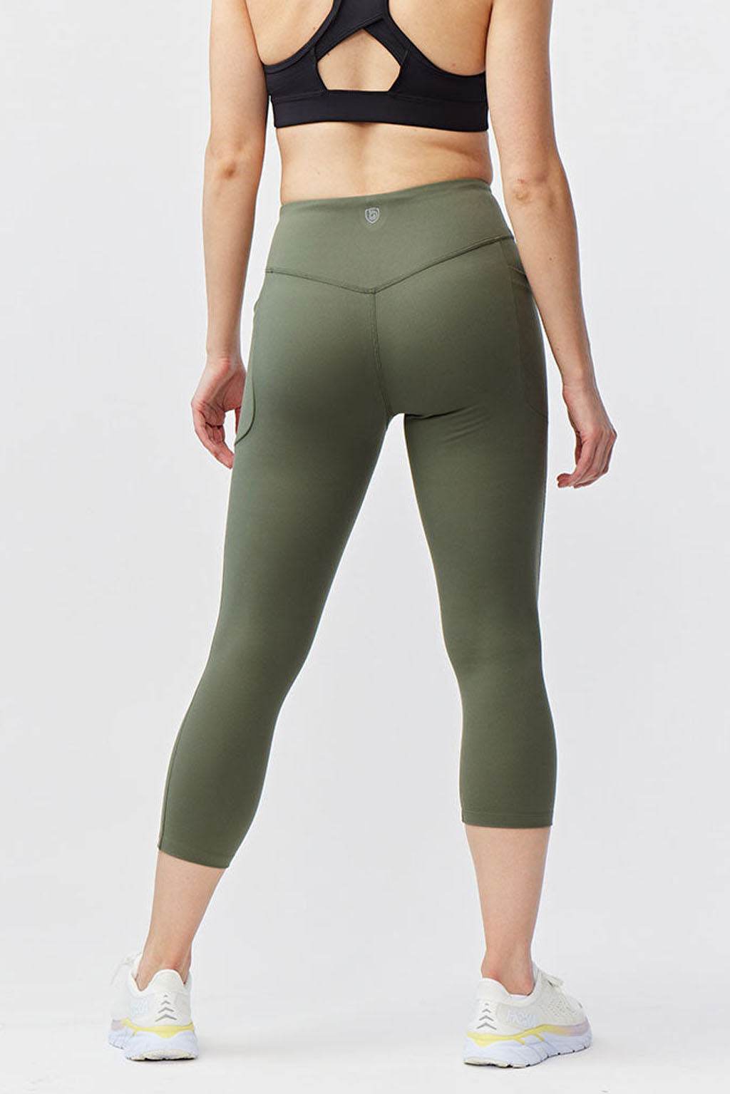 Go Again Crop Legging in solid olive green with a high-rise waistband, cropped length and smooth stretch fabric