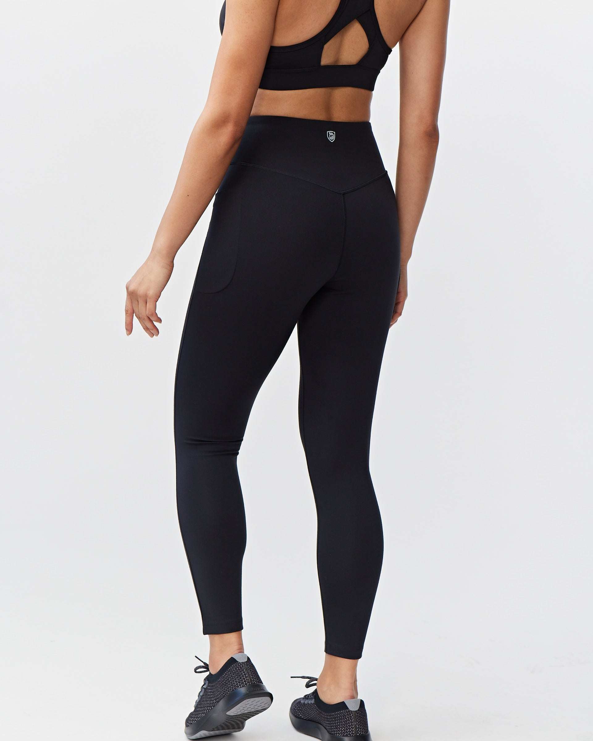 Go Again Full Length Legging in black stretch fabric with a high-rise waistband, sleek solid finish and ankle-length fit