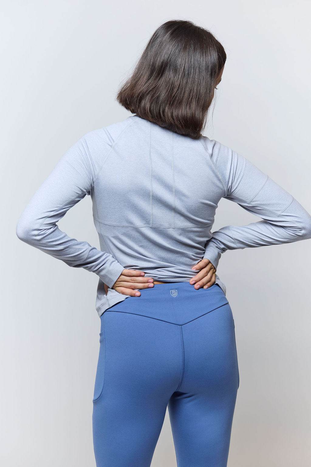 Go Again Full Length Legging in solid blue stretch fabric, high-rise waistband, full-length fit and side pockets