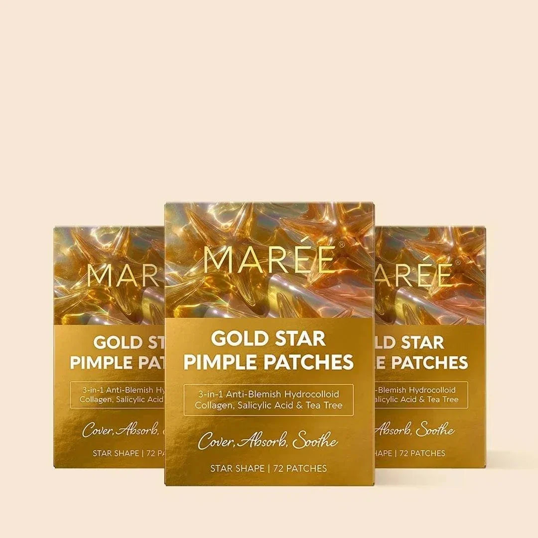 Gold Star Pimple patches in gold star-shaped hydrocolloid sheets, shown in three gold MARÉE boxes