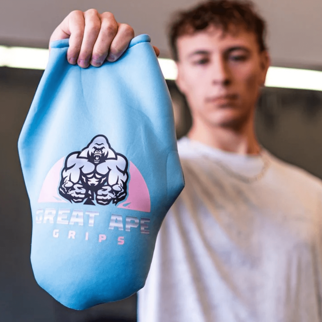 GREAT APE GRIPS blue neoprene grip training bag with gorilla logo and pink geometric accent