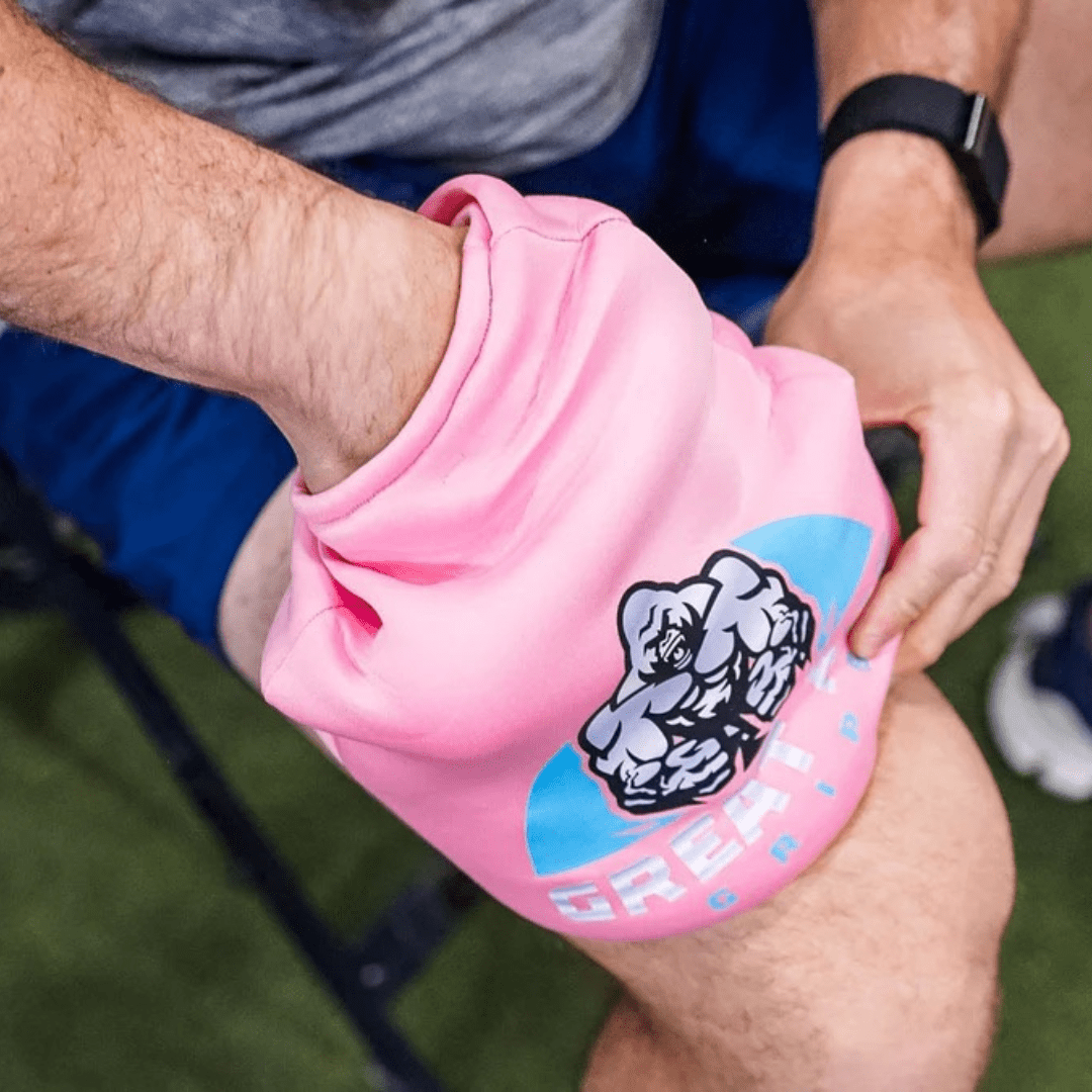 GREAT APE GRIPS pink fabric hand grip sleeve with blue accents and muscular ape logo