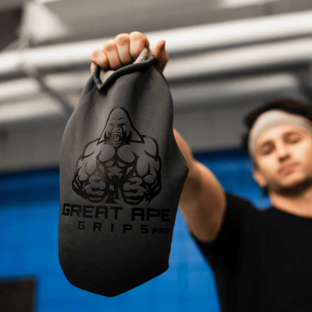 Great Ape Grips Pro charcoal neoprene grip trainer with attached hand strap and gorilla logo print