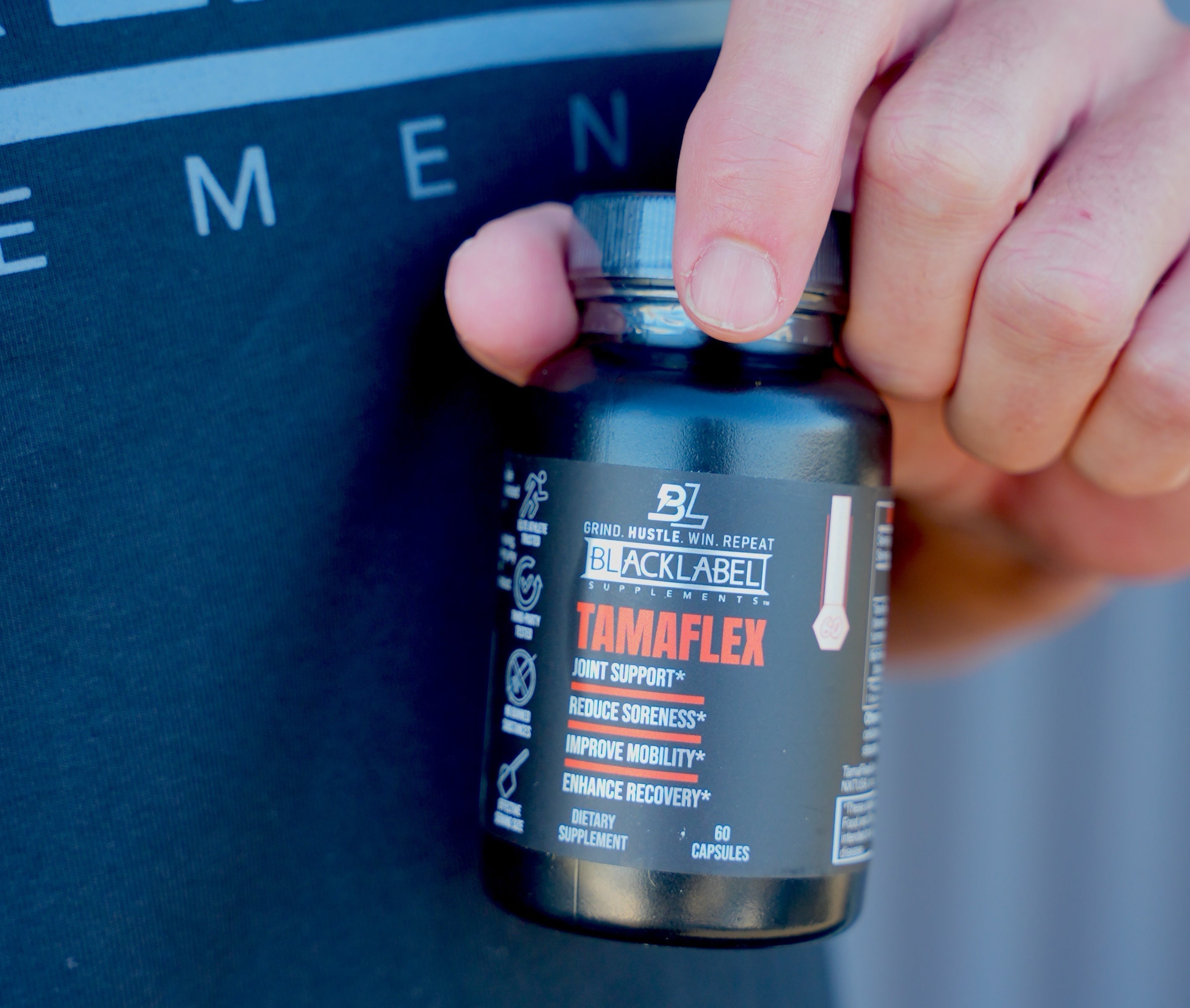HEALTH & WELLNESS STACK featuring a black TamaFlex supplement bottle with a blue cap and orange, white, and blue label.