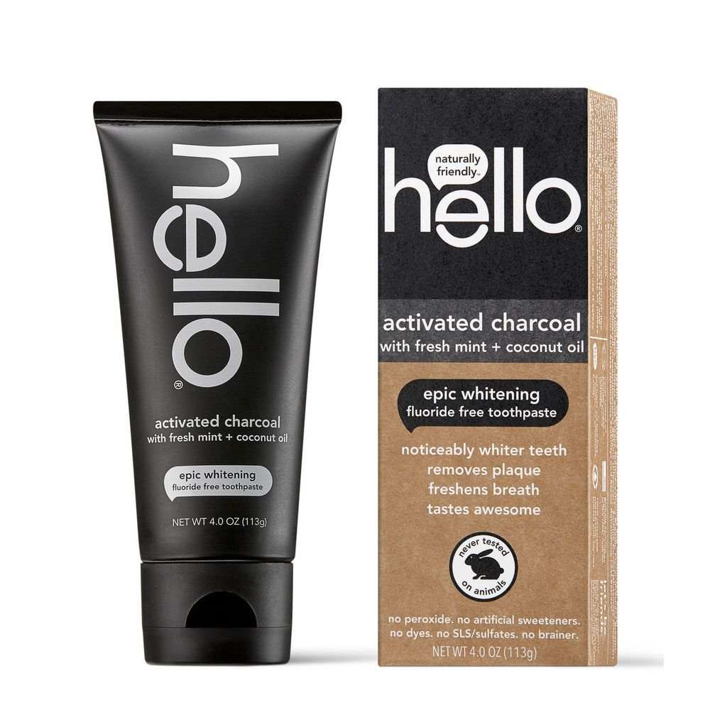 Hello® Activated Charcoal Toothpaste tube and box featuring black packaging with white text highlighting fresh mint, coconut oil, and fluoride free formula