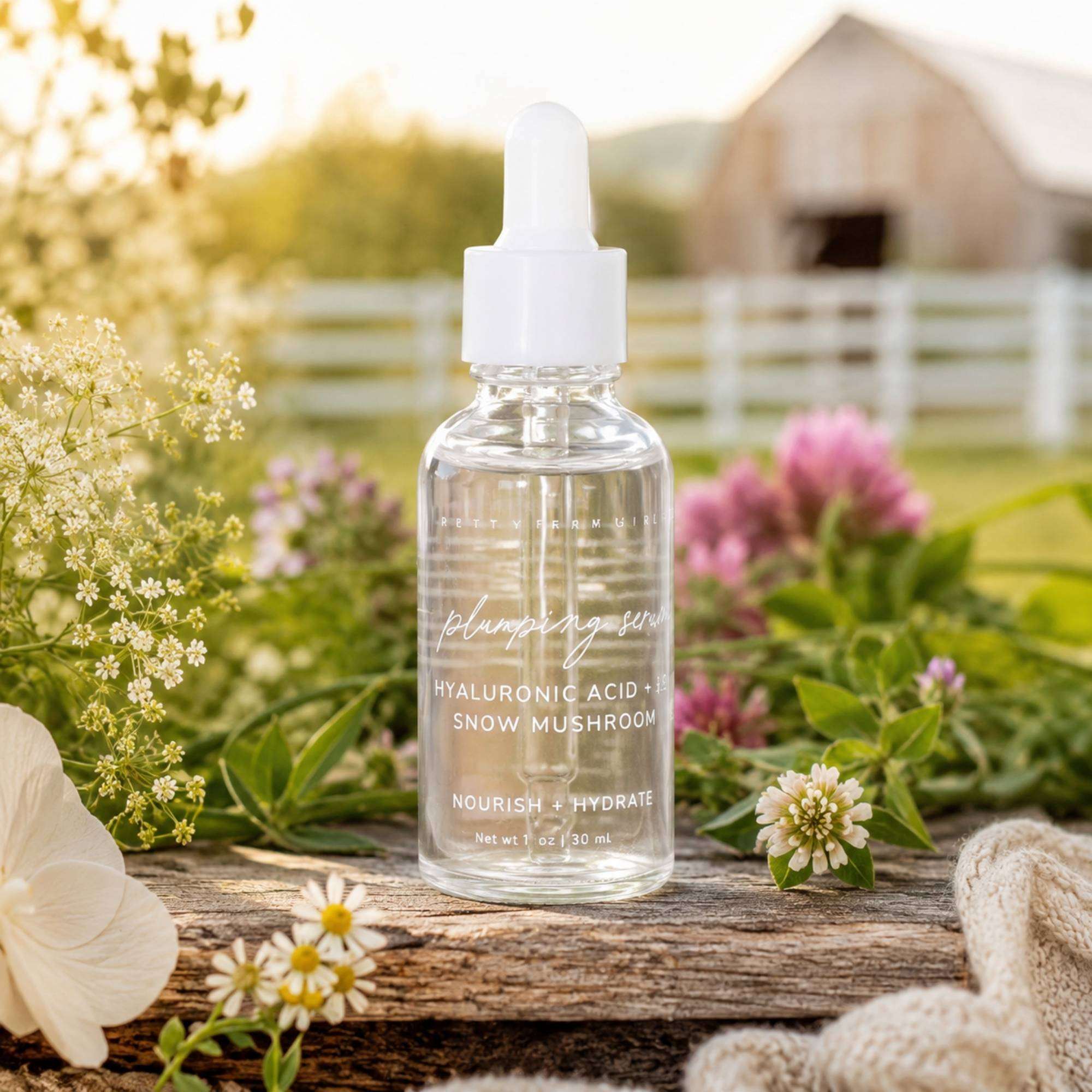 Hyaluronic Acid Plumping Serum in a clear glass dropper bottle, featuring a white cap and transparent formula