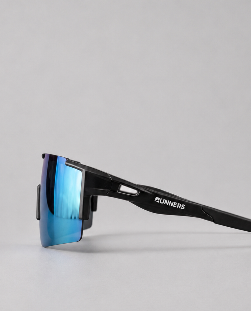 Ice Blue Polarized Running Sunglasses with a frameless blue mirrored lens and sleek black arms.