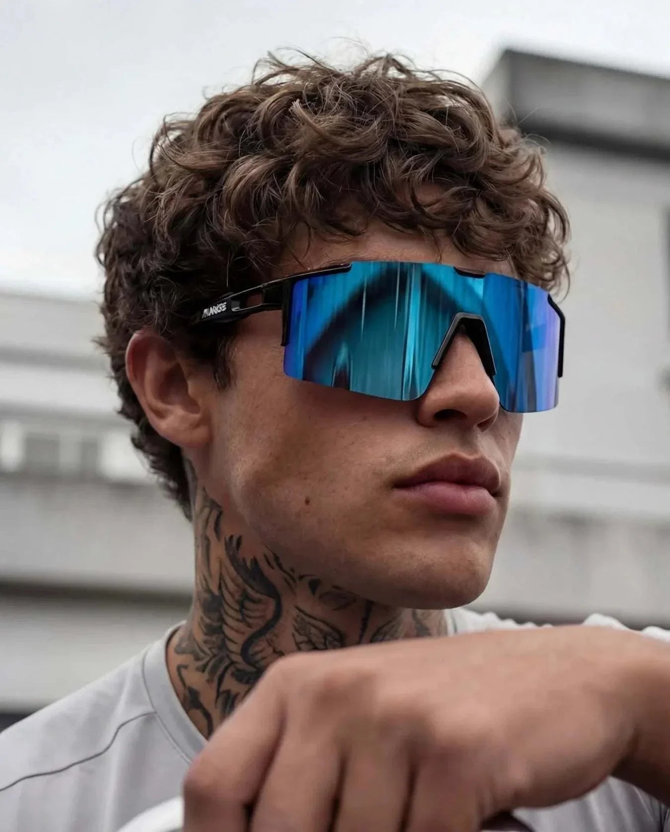 Ice Blue Polarized Running Sunglasses with oversized frameless blue mirrored lenses and slim black temples