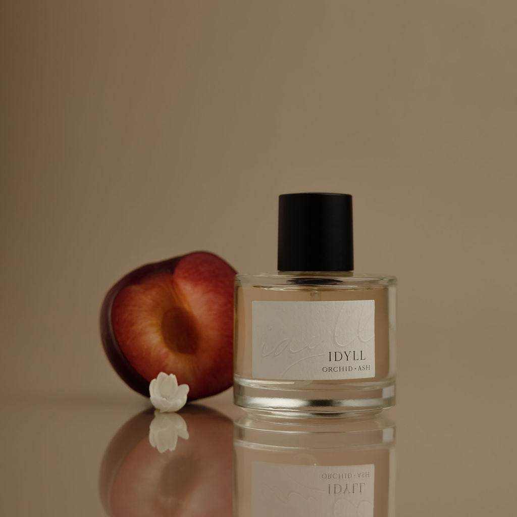 IDYLL perfume bottle with jasmine incense and vanilla notes