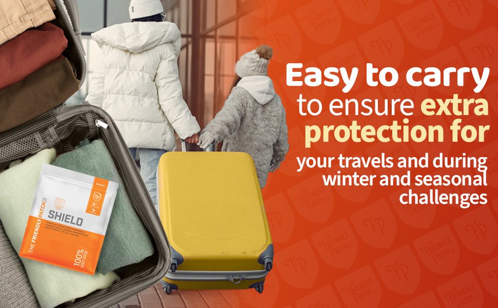 Immunity Patches in orange and white resealable pouch with Shield branding, shown inside an open suitcase with travel clothes.