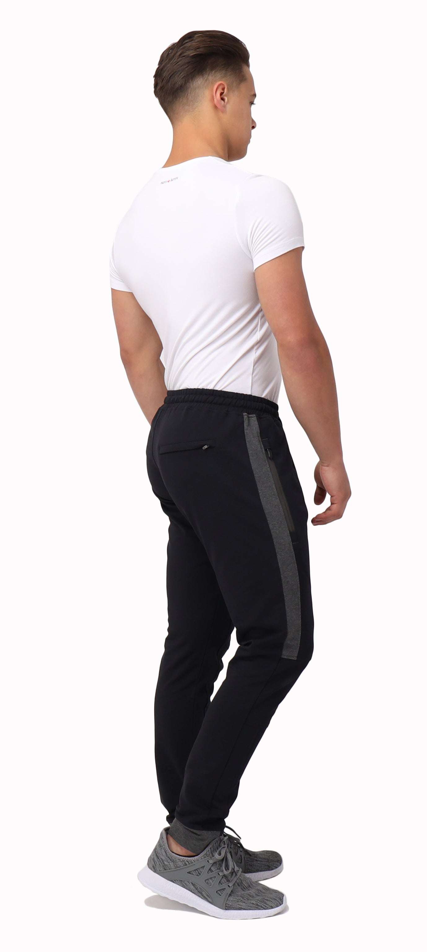Infinite Flex Jogger in black with a dark gray side stripe, cuffed ankles, and a stretch waistband with drawstring