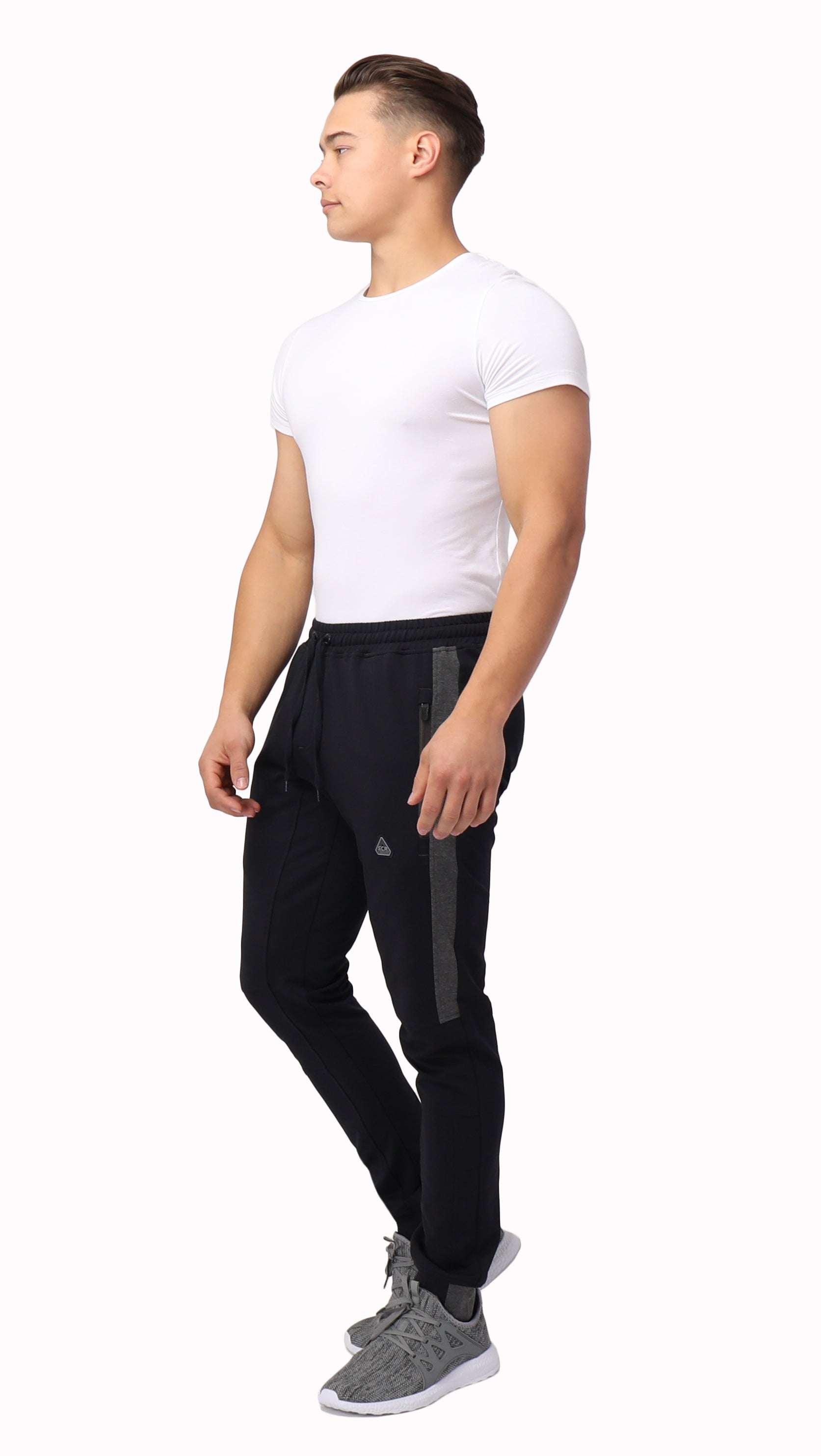 Infinite Flex Jogger in black stretch fabric with a drawstring waistband, tapered legs and cuffed ankles
