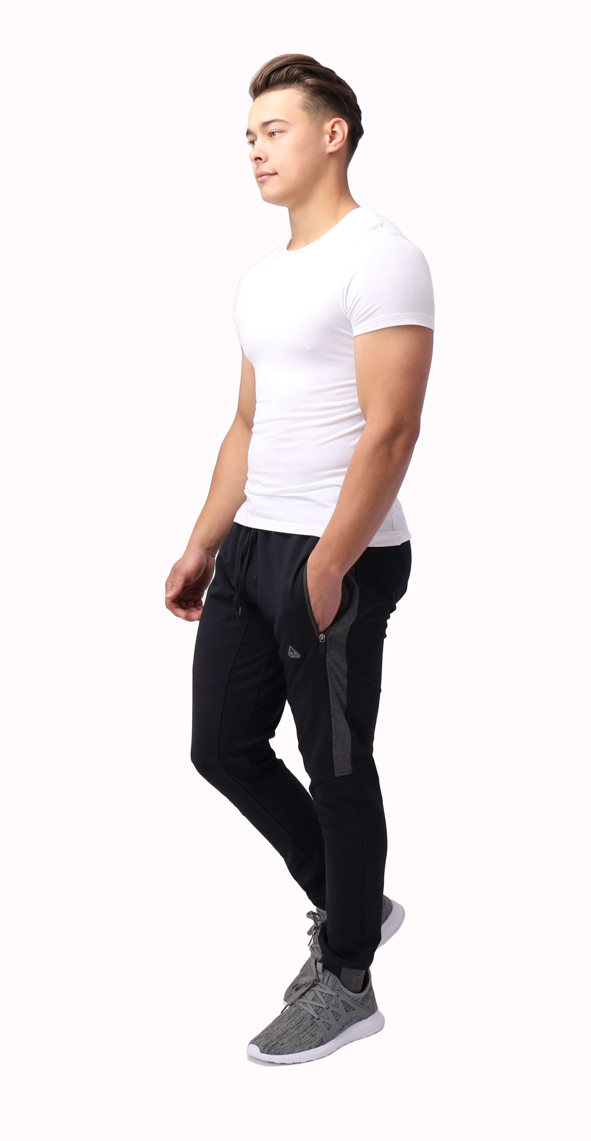 Infinite Flex Jogger in black with a stretch waistband, tapered legs and cuffed ankles, styled with subtle side detailing