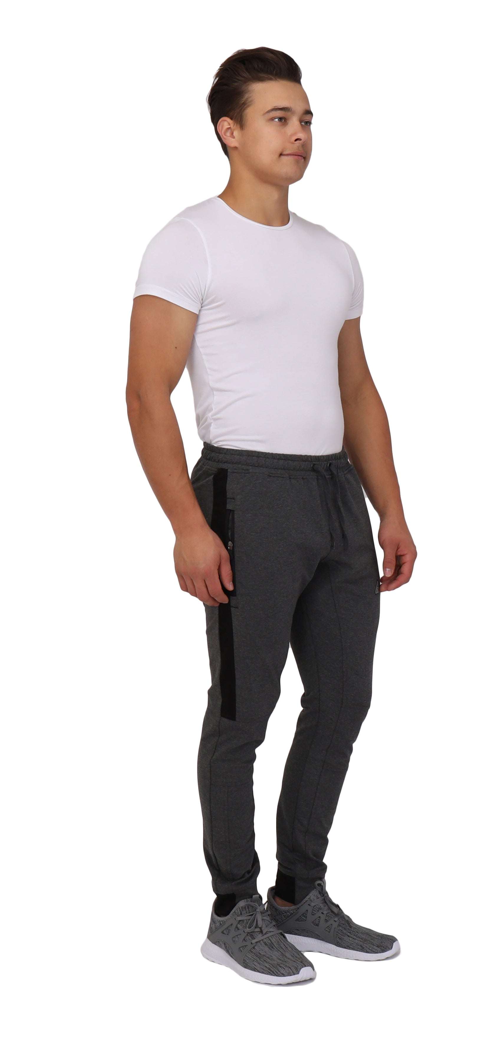 Infinite Flex Jogger in dark charcoal with a stretch waistband, tapered legs, cuffed ankles and zippered side pockets