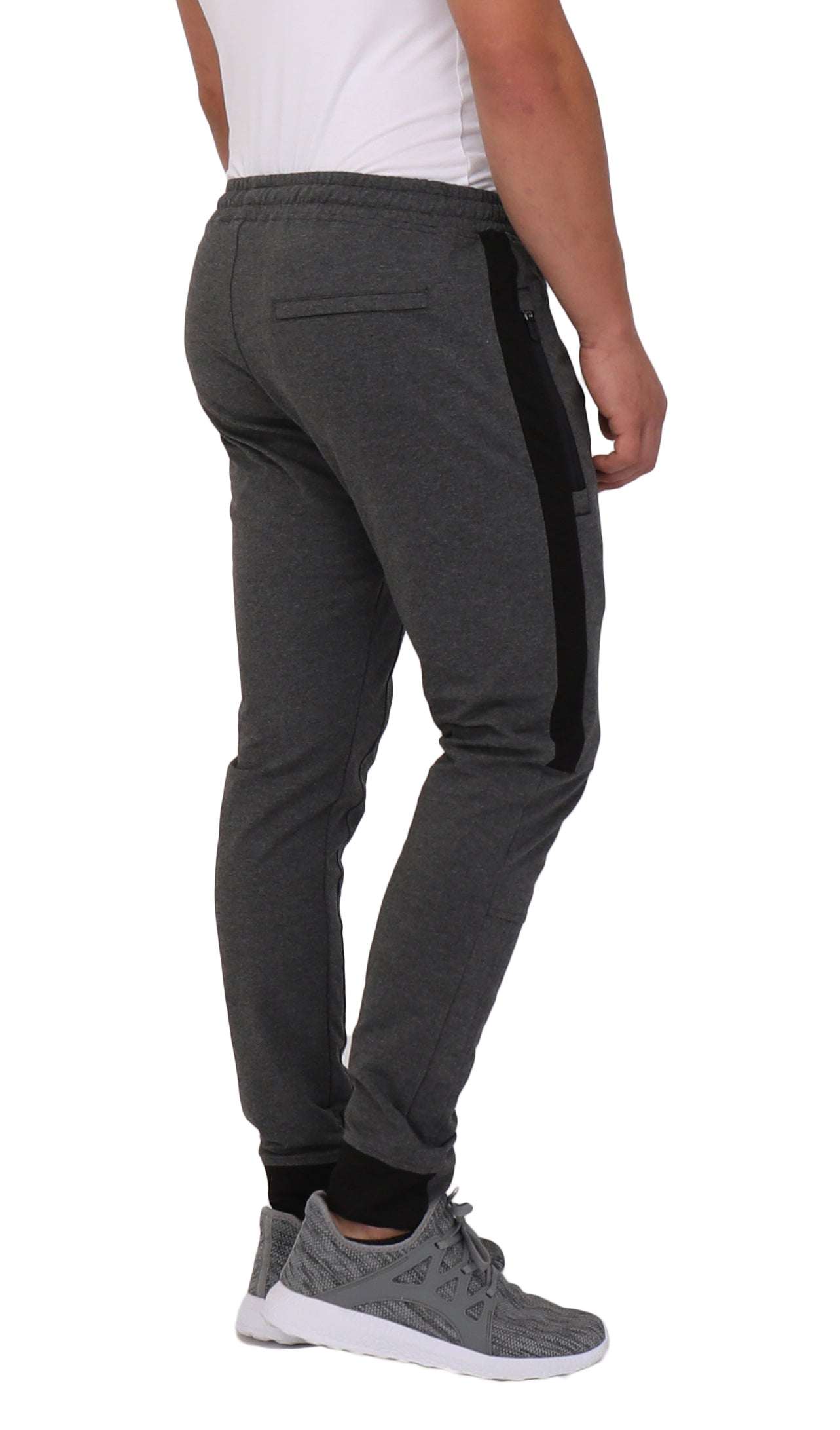 Infinite Flex Jogger in charcoal gray stretch fabric with black side stripes, elastic waist, rear zip pocket and cuffed ankles