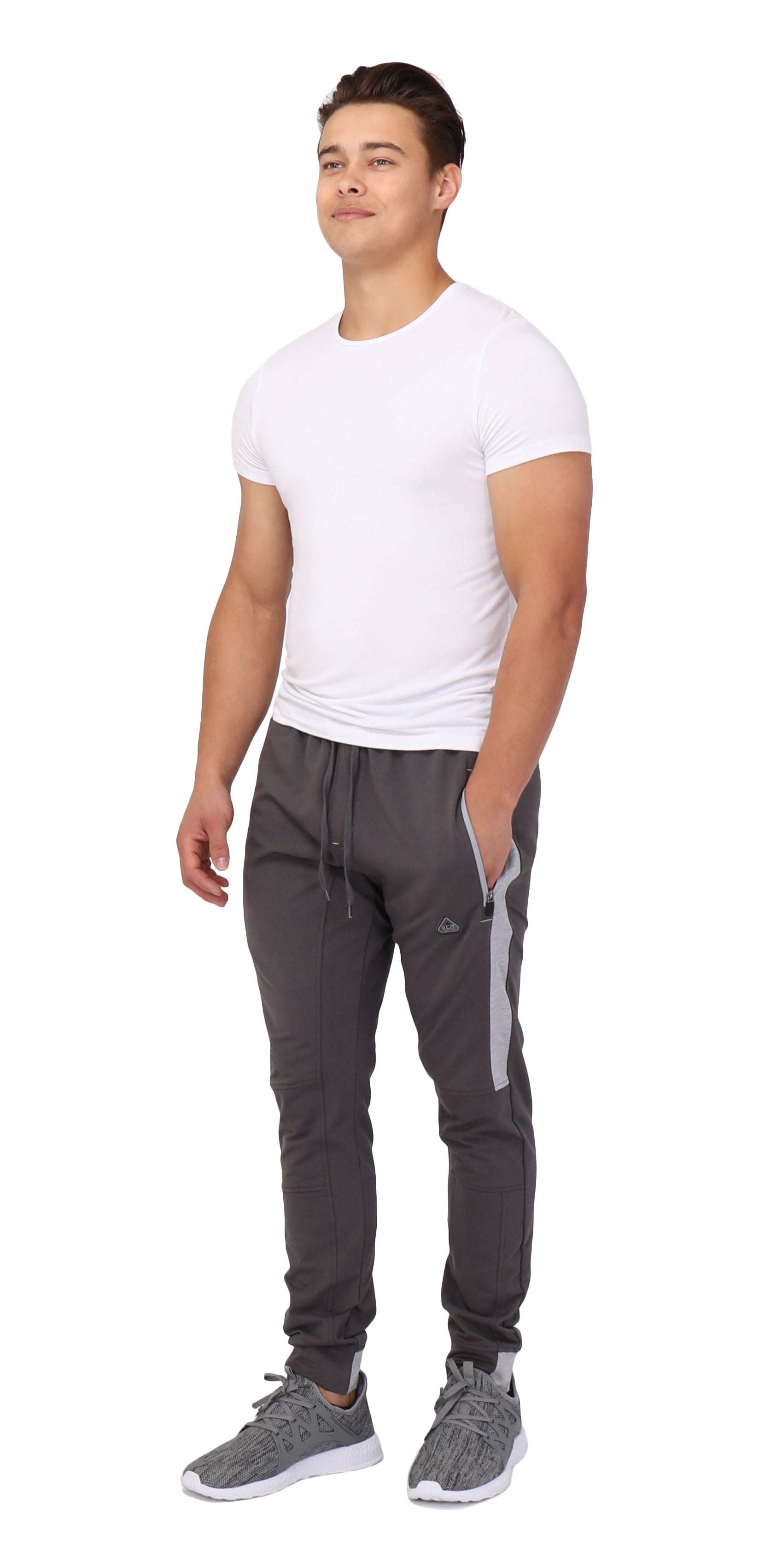 Infinite Flex Jogger in charcoal gray stretch fabric with tapered legs, light gray side panels, cuffed ankles and drawstring waist