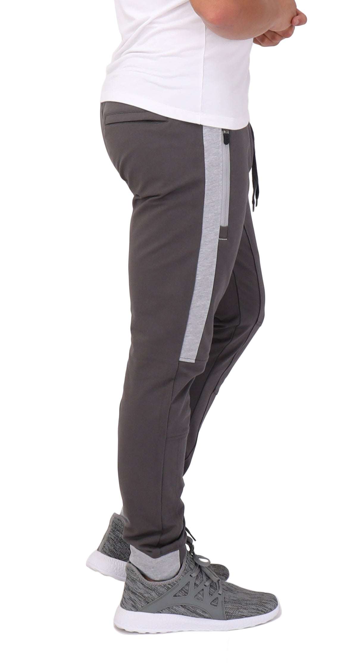 Infinite Flex Jogger in charcoal gray stretch fabric, with a light gray side stripe, cuffed ankles and drawstring waist