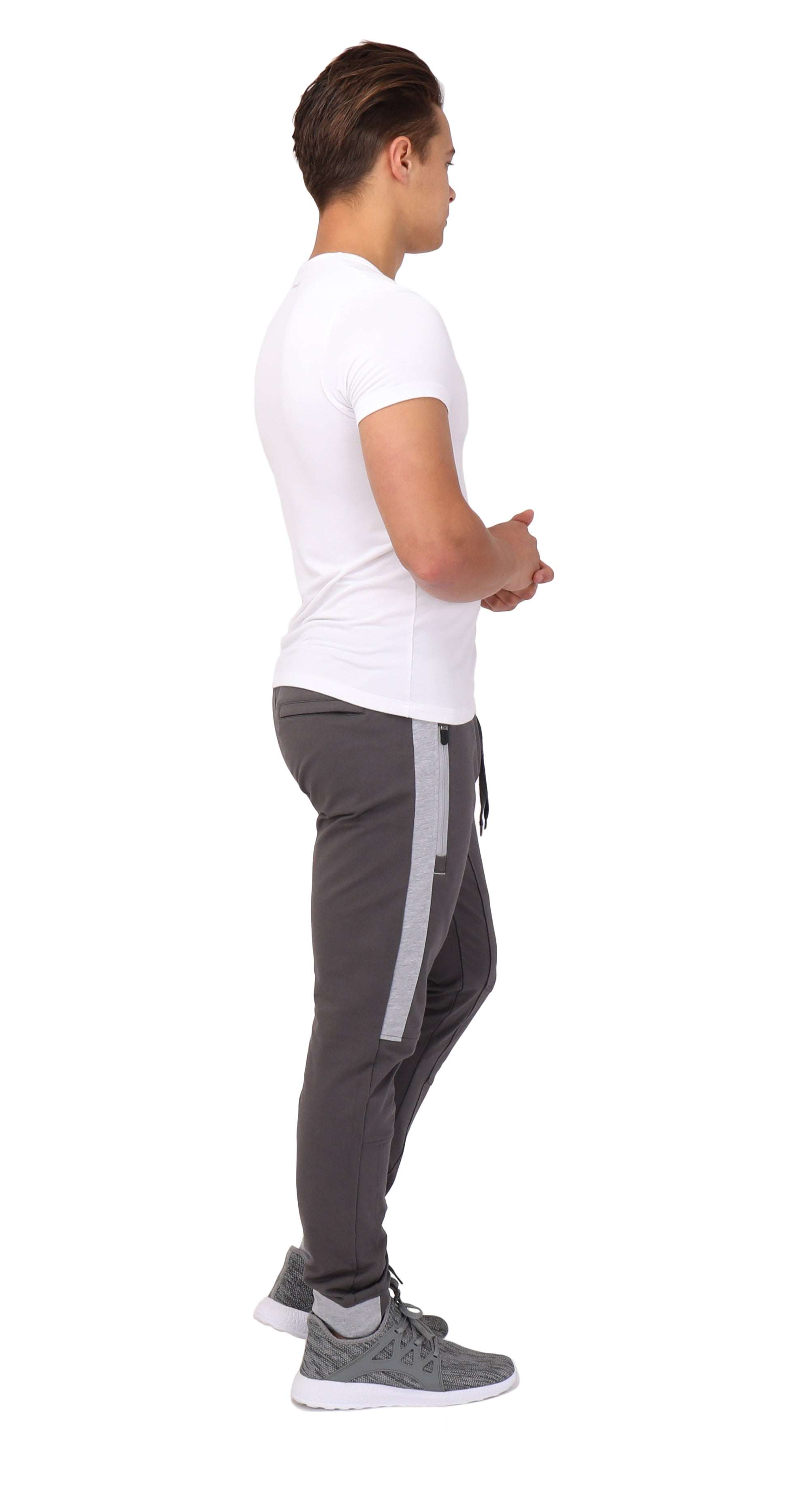 Infinite Flex Jogger in charcoal gray stretch fabric, featuring a light gray side stripe, tapered legs and cuffed ankles