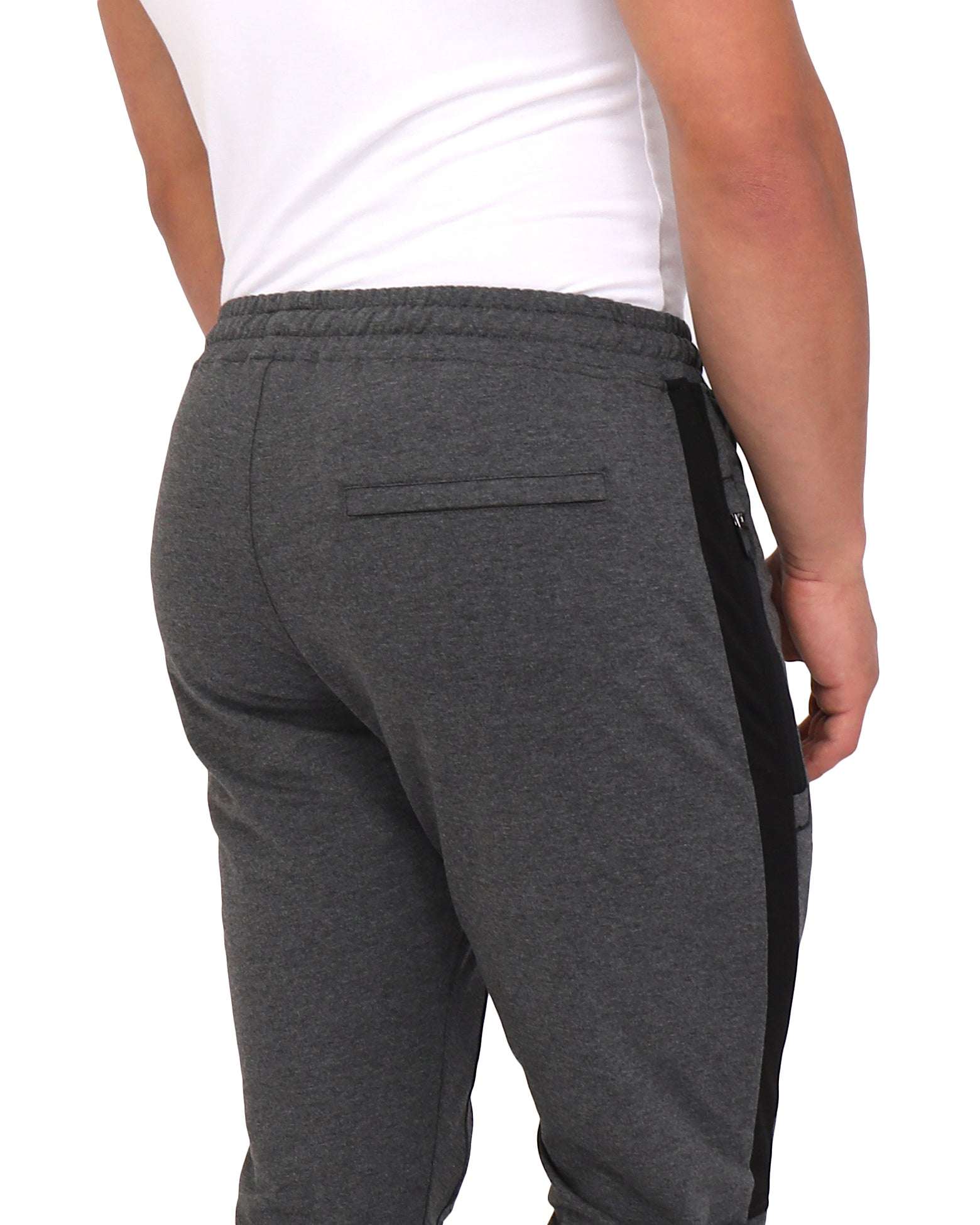 Infinite Flex Jogger in charcoal grey stretch fabric, showing an elastic waistband and slim back welt pocket