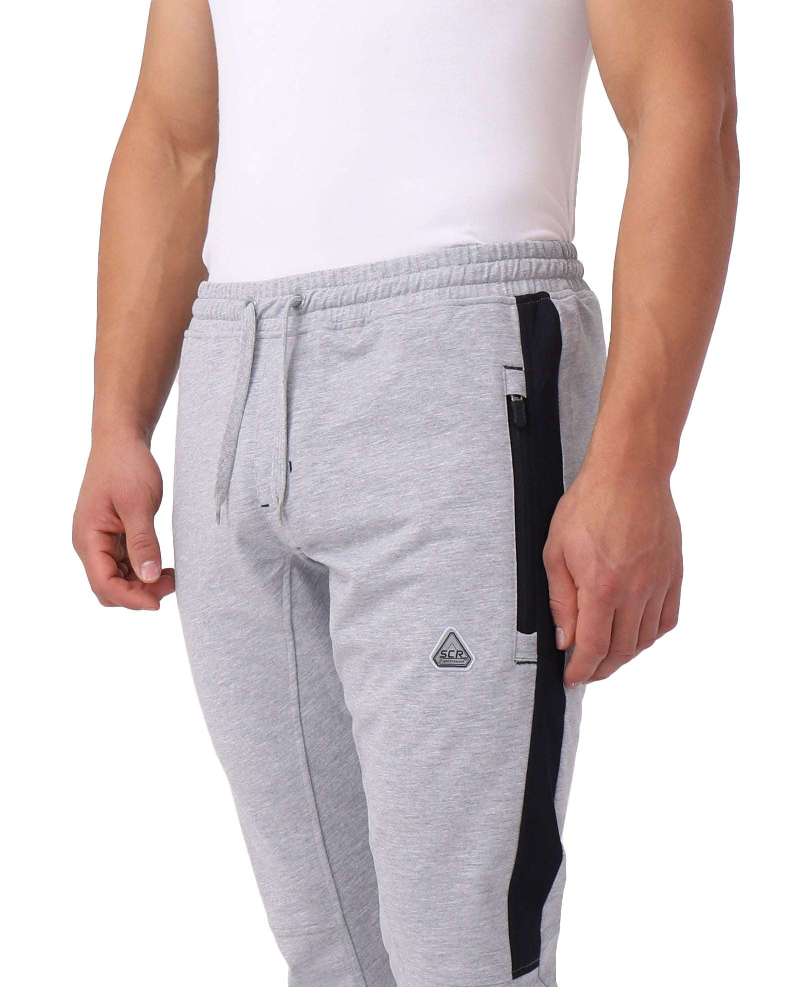 Infinite Flex Jogger in heather gray cotton-blend with a drawstring waistband, black side stripe, and zippered pocket