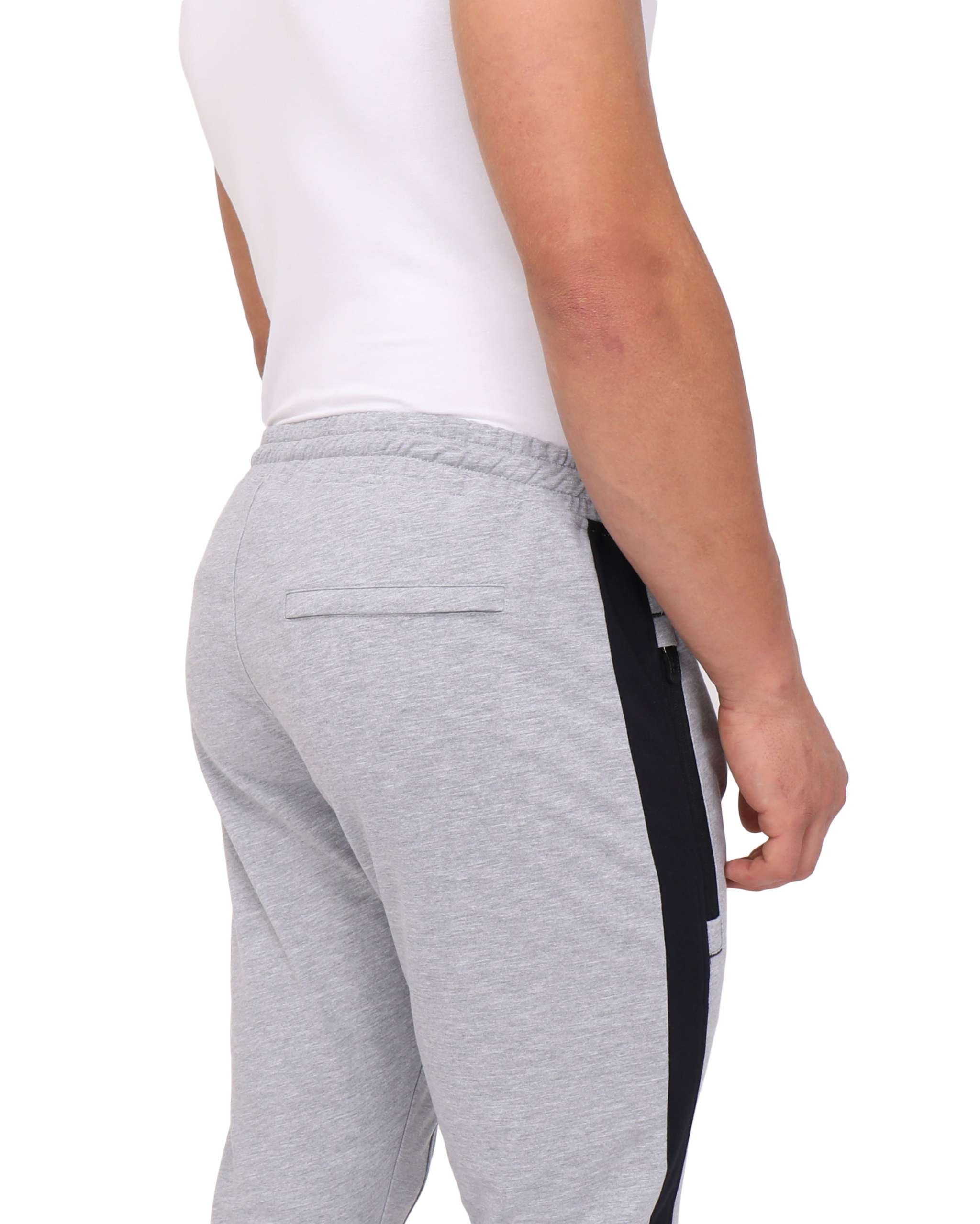 Infinite Flex Jogger in light gray cotton blend with black side panels, elastic waistband, and back welt pocket