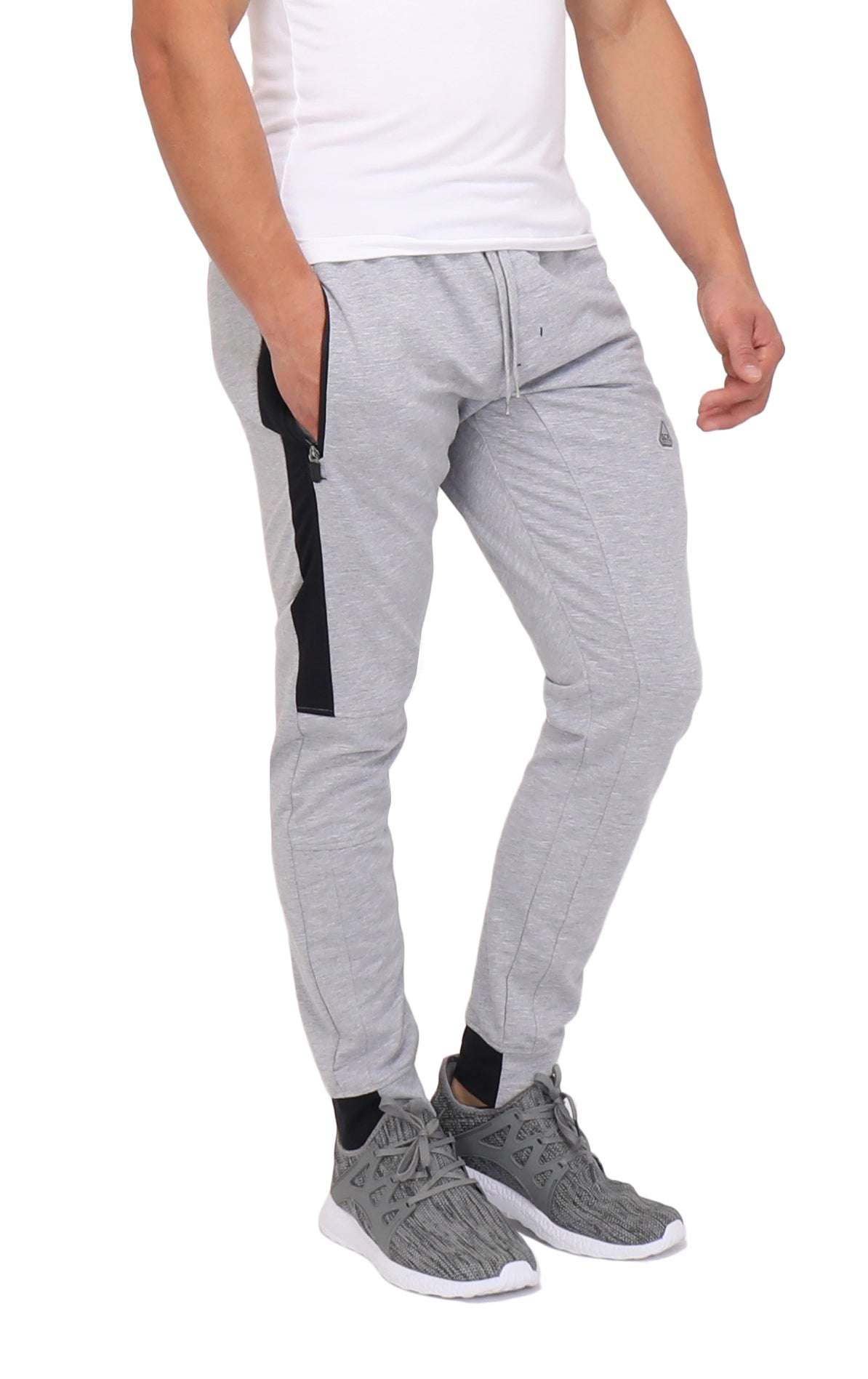 Infinite Flex Jogger in light gray cotton-blend stretch fabric with black side panels, zip pockets and cuffed ankles